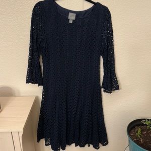Navy blue dress, fully lined with eyelet lace overlay, bell sleeves